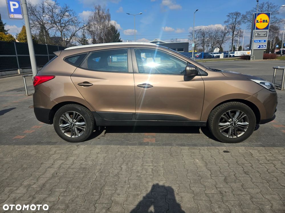 Hyundai ix35 1.7 CRDi 2WD blue Finale Gold - 8