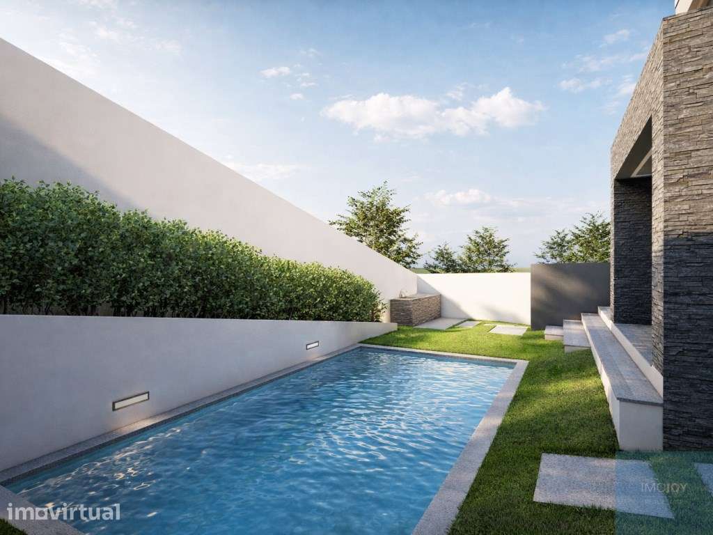 Moradia Isolada T4+1 de Arquitetura Contemporânea com Piscina no Es... - Grande imagem: 3/24
