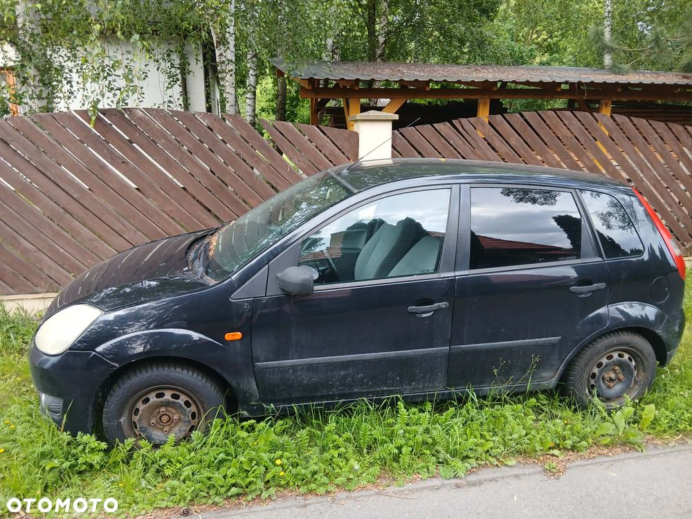 Ford Fiesta 1.4 Ghia - 7