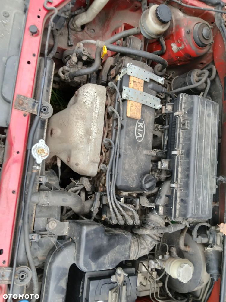 KIA RIO LS 5D VR silnik 1.3 P83C skrzynia U12B napęd sanki belka wahacz wahacze zacisk zaciski - 3