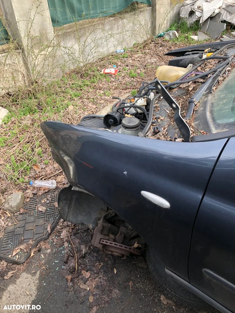 Aripa stanga fata Fiat Albea gri inchis 2005 - 7