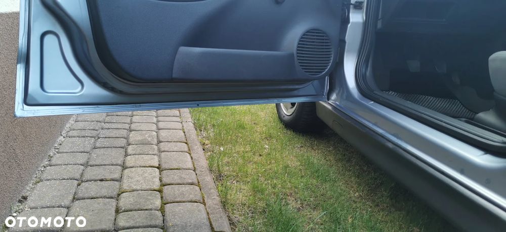 Opel Corsa 1.2 16V Enjoy - 25