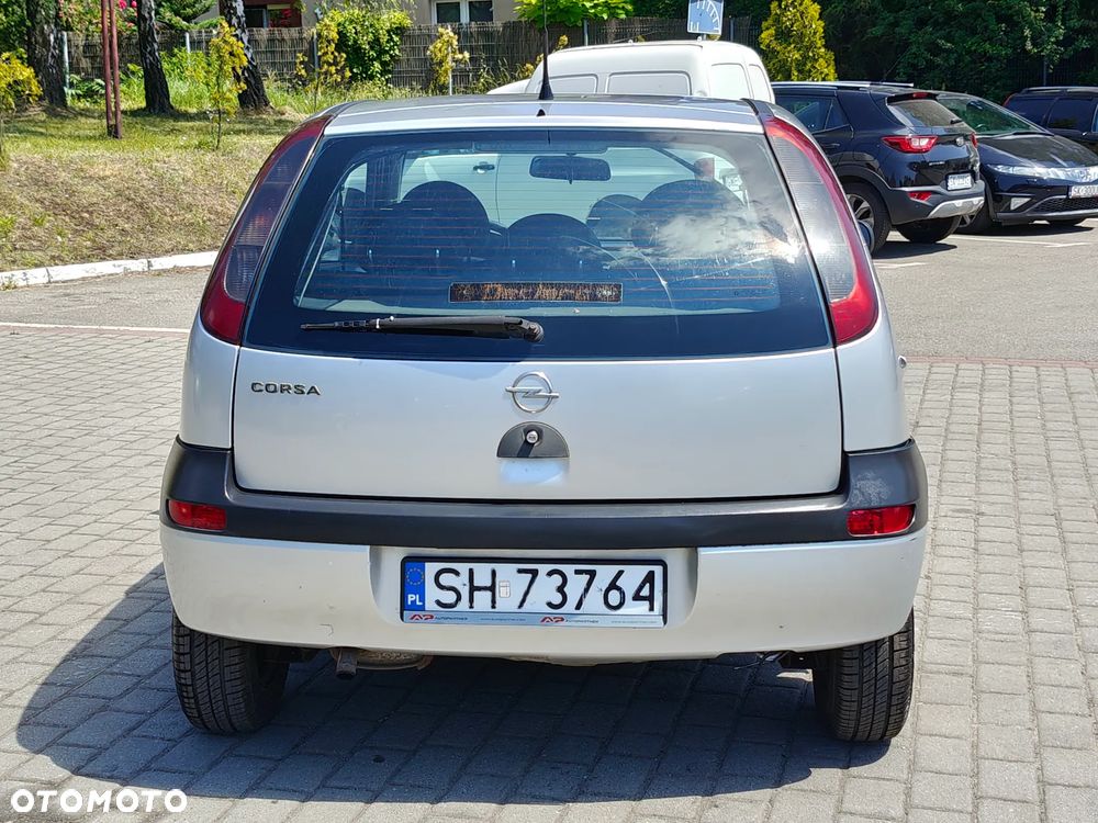 Opel Corsa 1.2 16V Enjoy - 11