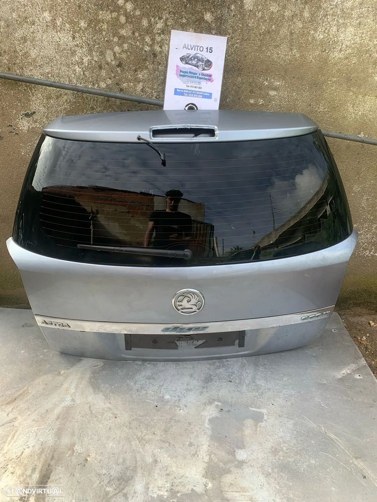 Porta mala Opel Astra H - 1