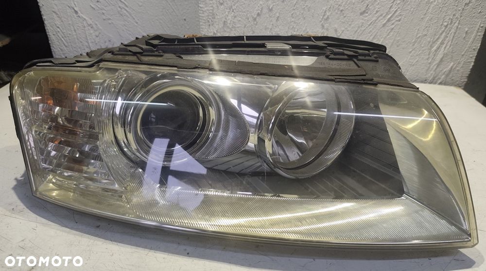 AUDI A8 D3 03r LAMPA BI-XENON PRAWY PRZÓD EUROPA KOMPLETNA BEZ DOŚWIETLENIA - 1