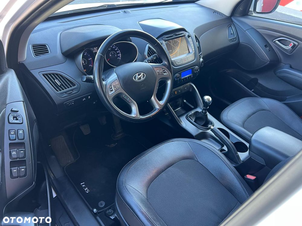 Hyundai ix35 1.7 CRDi 2WD blue Finale Gold - 12