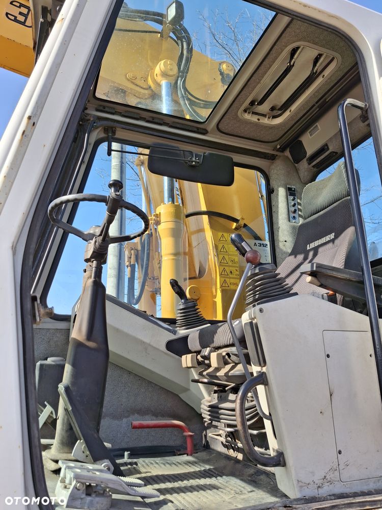 Liebherr A312 CAT JCB - 6