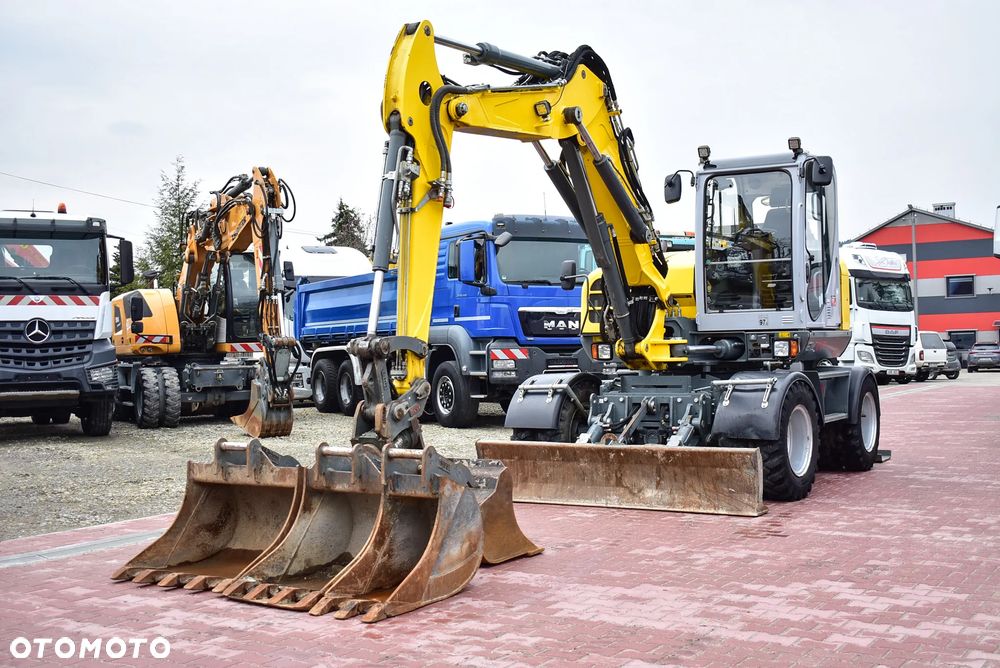 Wacker Neuson EW 100 Koparka kołowa 10.5 T/ Powertilt/ 4 Łyżki/ Podpory + Pług/ 2021/ 3.700 Mth/ Sprowadzona z Austri ! - 1