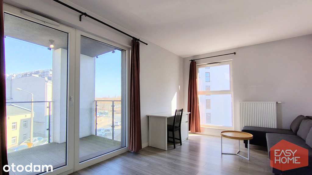 Apartament z komórką lok. i miejscem parkingowym.
