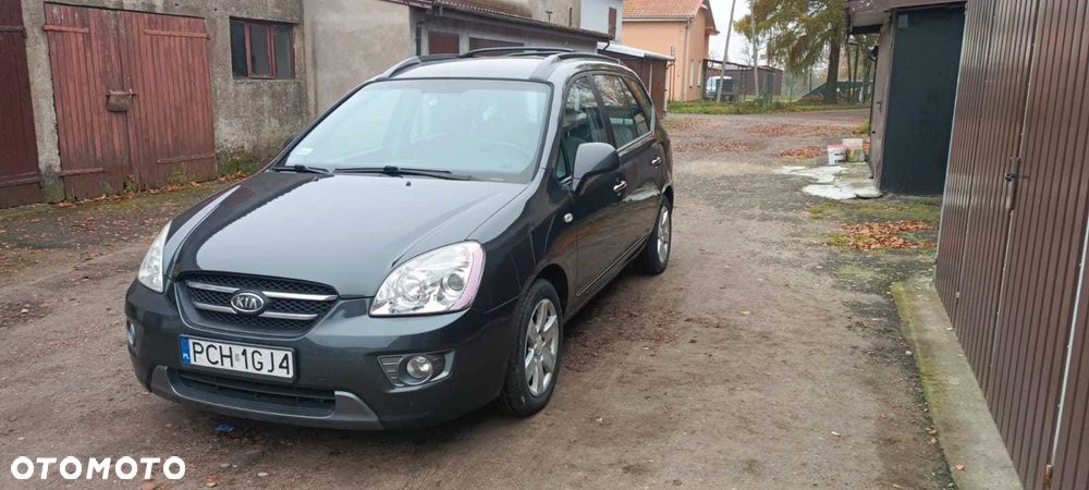 Kia Carens - 4