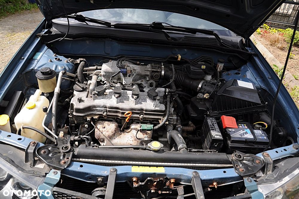 Nissan Almera 1.5 Visia + - 14