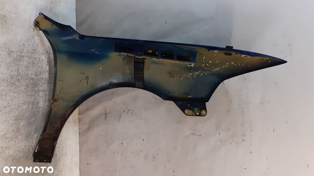 * SKODA OCTAVIA II 2 SCOUT BŁOTNIK PRZÓD PRZEDNI LEWY GRANATOWY - 4