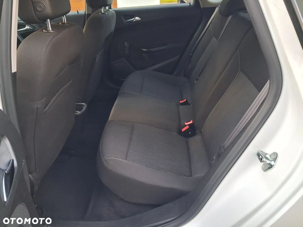 Opel Astra 1.6 Cosmo - 8