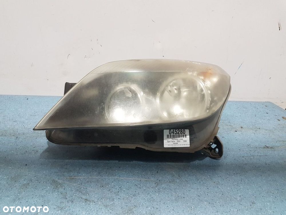 OPEL ASTRA H REFLEKTOR LEWY - 1