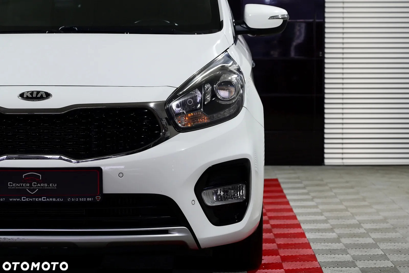Kia Carens - 33