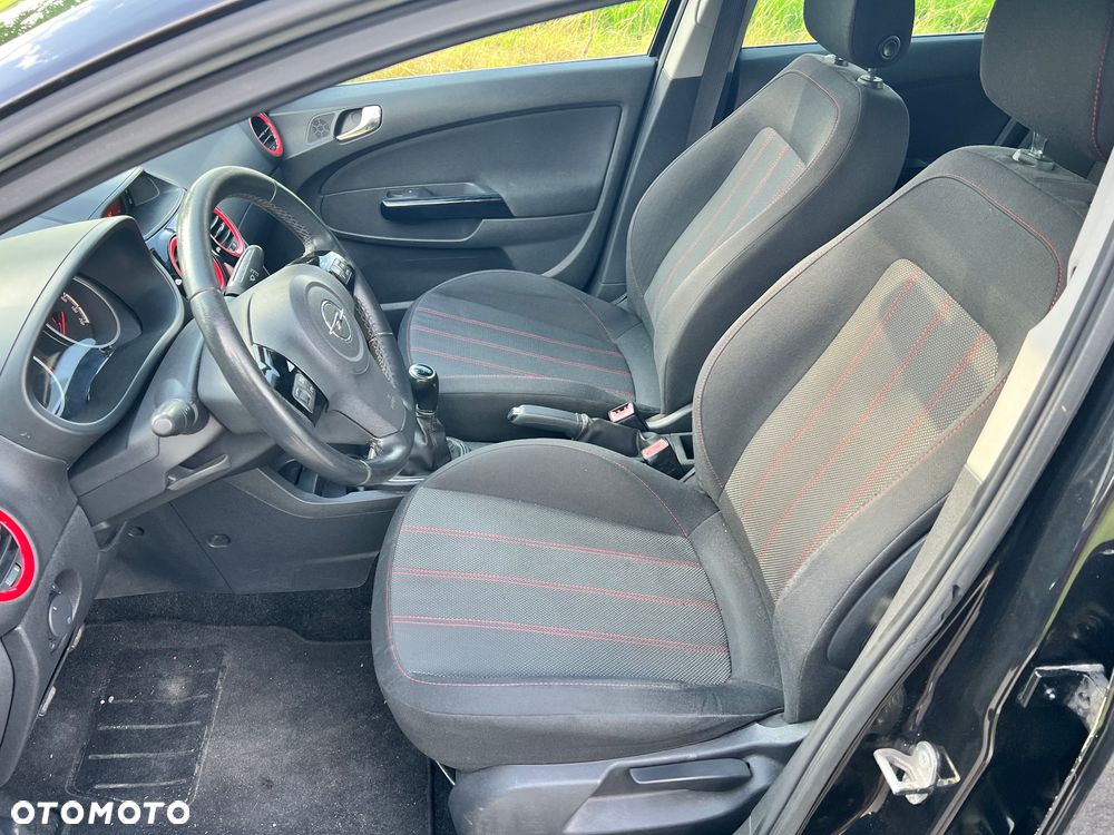 Opel Corsa 1.4 16V Cosmo - 11