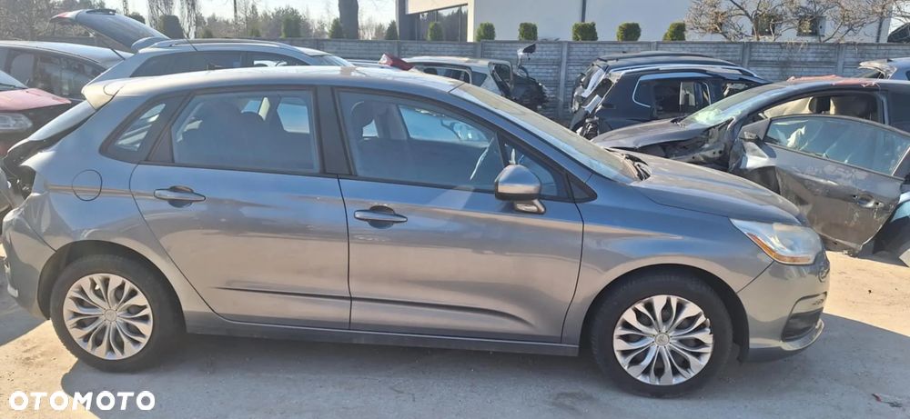 Citroen C4 II B7 lampa prawy przód - 4
