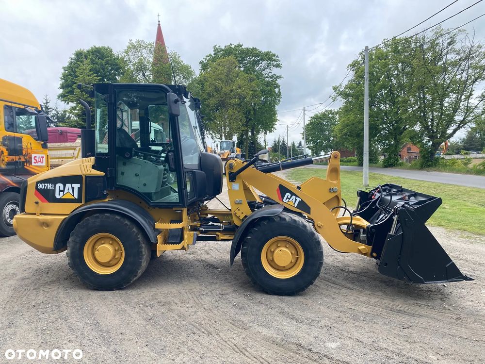 Caterpillar CAT 907H2, 2014 ROK, 4900 MTH, ŁYŻKA OTWIERANA + WIDŁY, z NIEMIEC, - 8