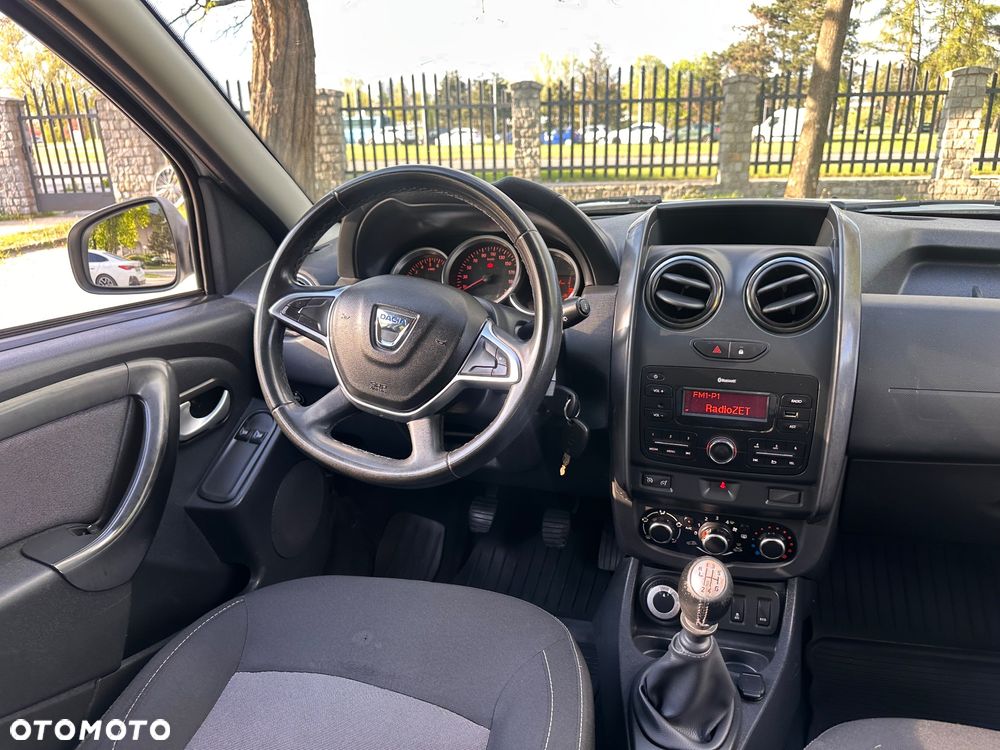 Dacia Duster 1.6 SCe Comfort 4WD - 7
