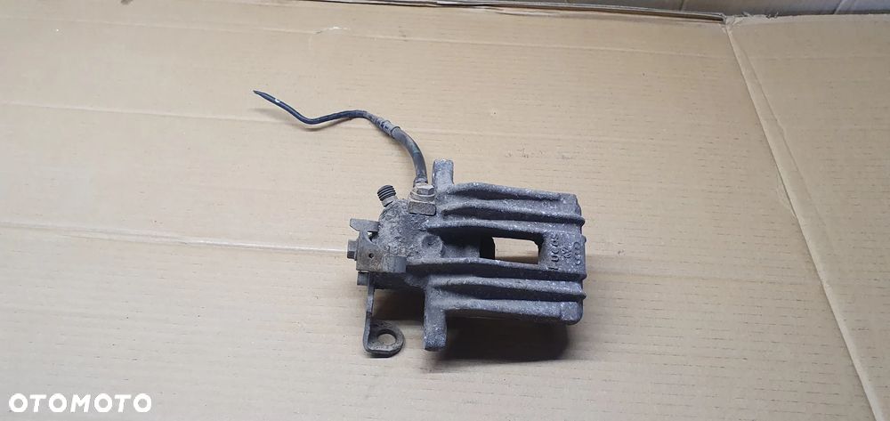 Zacisk hamulcowy prawy tył tylny prawy Seat Ibiza IV 6J - 1