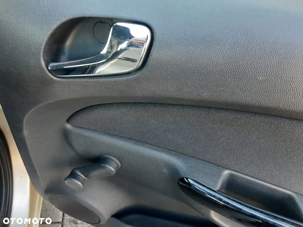 Opel Corsa 1.2 16V Enjoy - 30