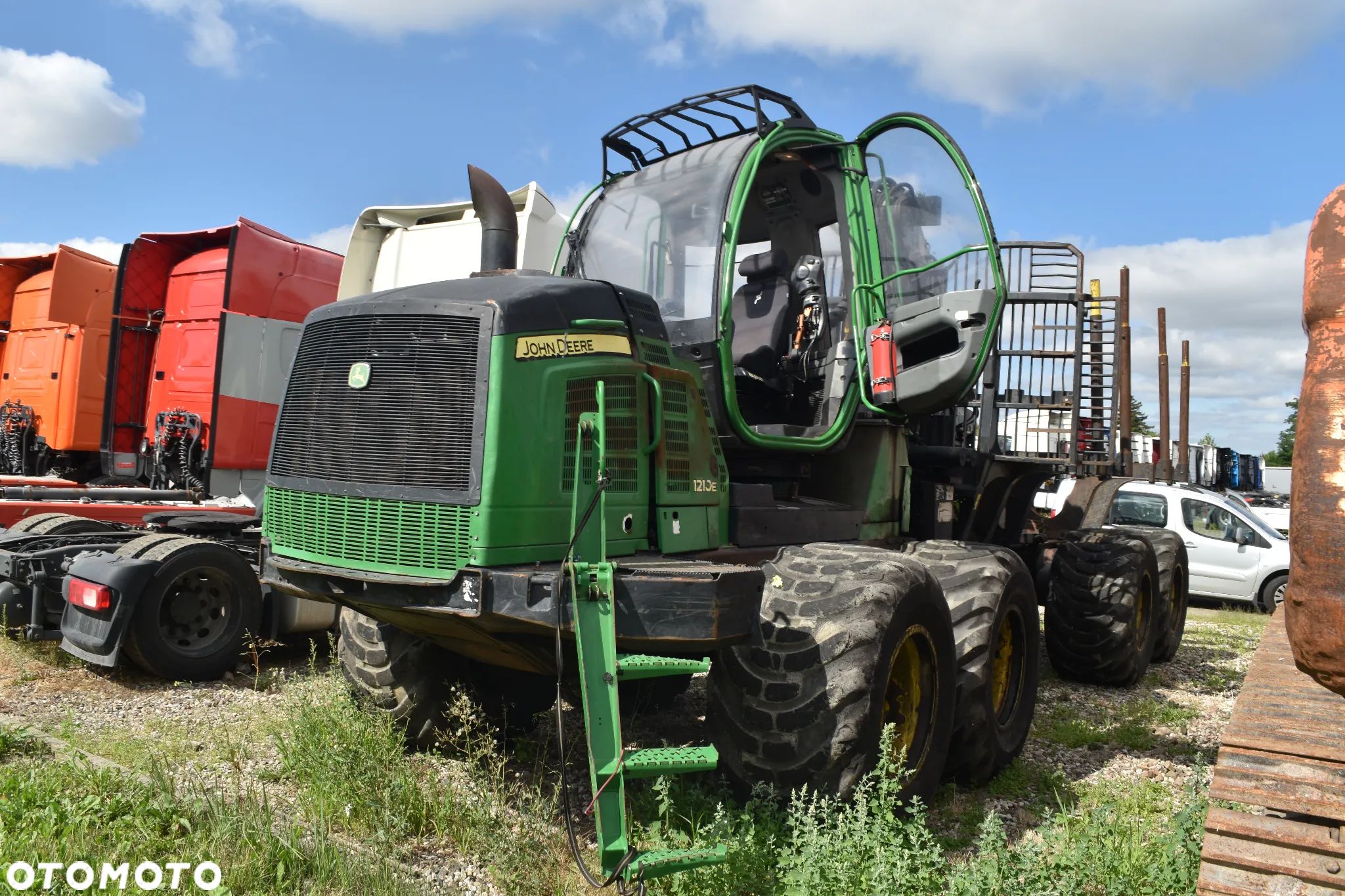 John Deere 1210E - 1