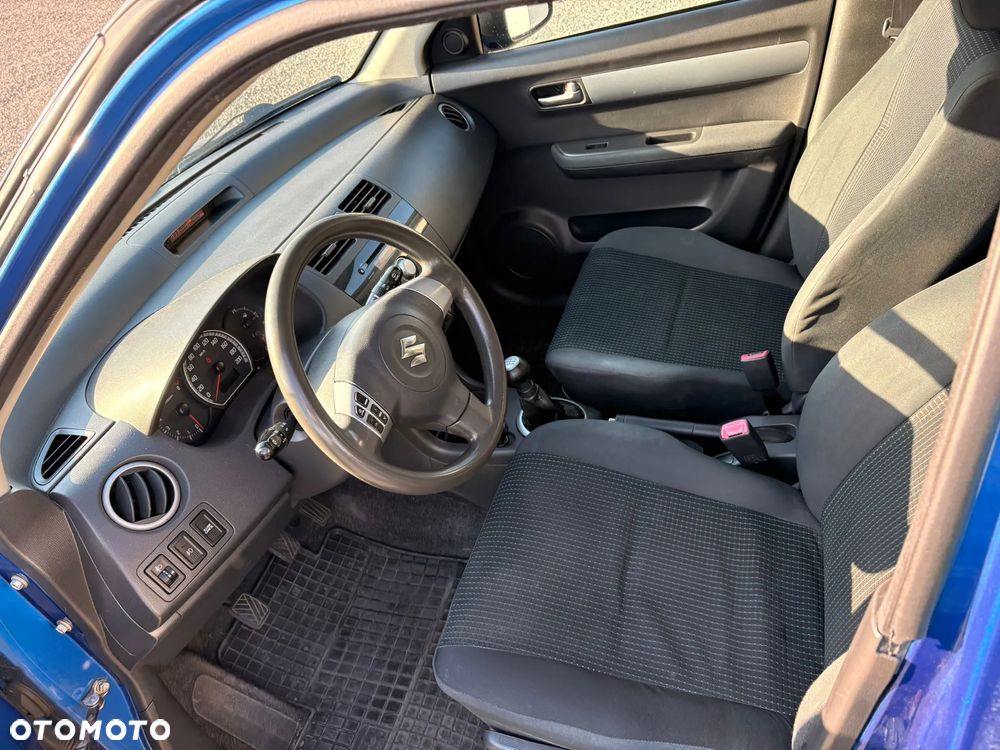 Suzuki Swift 1.3 Club - 11