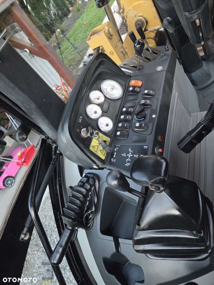 Caterpillar CAT 428E - 30