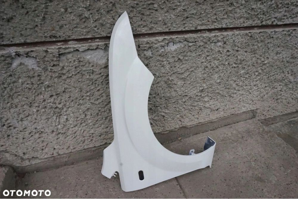 BŁOTNIK PRAWY FOCUS II MK2 DIAMOND WHITE N3 04/08r - 2