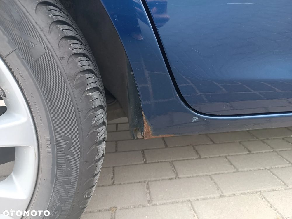 Opel Corsa 1.4 16V Cosmo - 23
