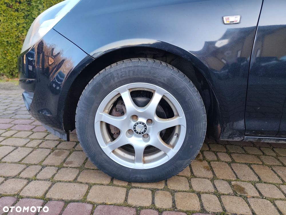 Opel Corsa 1.4 16V Essentia - 26