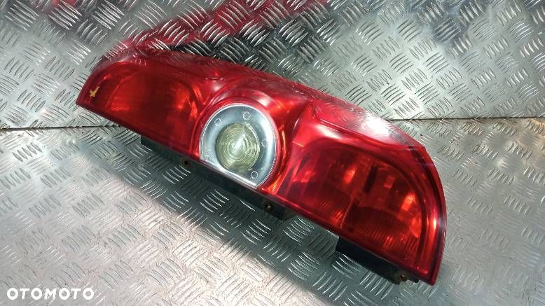 LAMPA LEWA TYLNA FIAT DOBLO 2 - 1