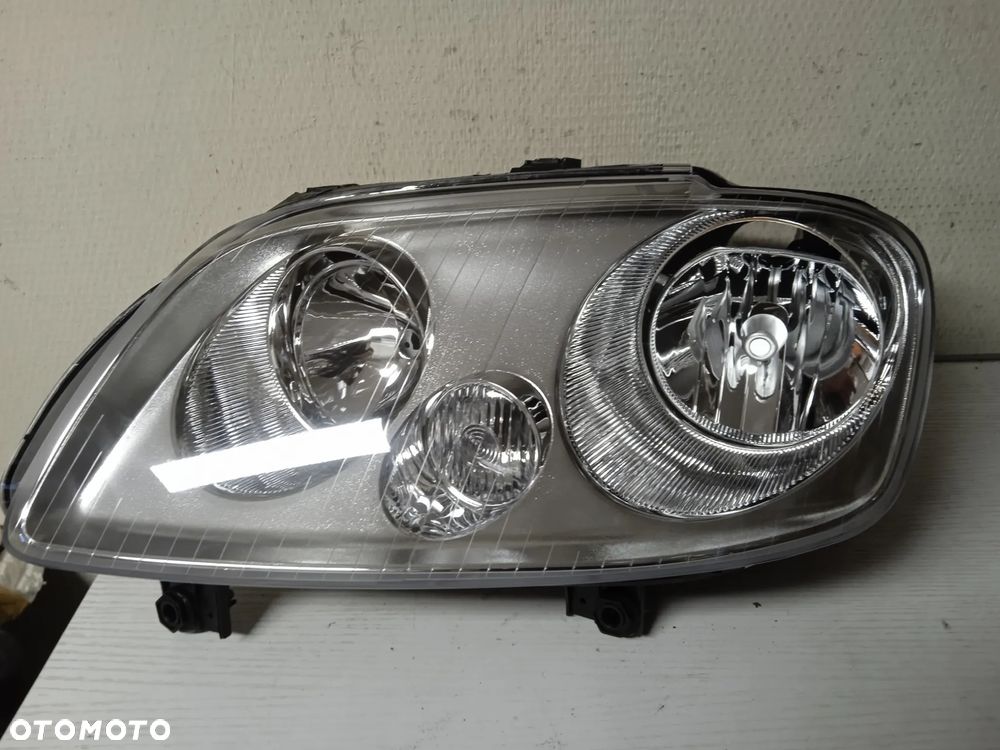 REFLEKTOR LEWY LUB PRAWY VW CADDY 04-10 TOURAN 03-06 NOWY - 2