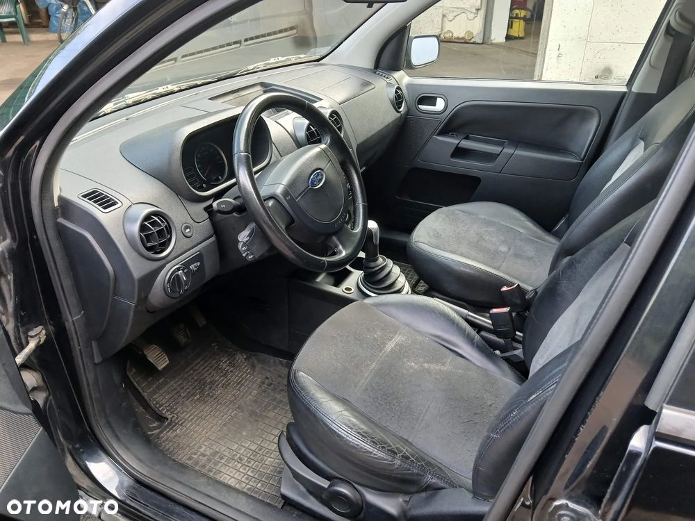 Ford Fusion 1.4 TDCI + - 9