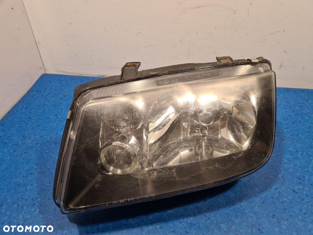 VOLKSWAGEN BORA I REFLEKTOR LEWY - 1