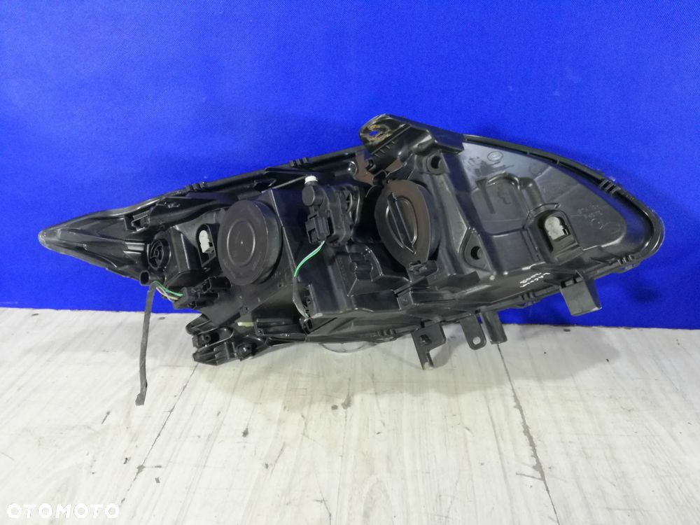 Renault Laguna III 3 07/10 lampa reflektor przód lewa Anglik - 2