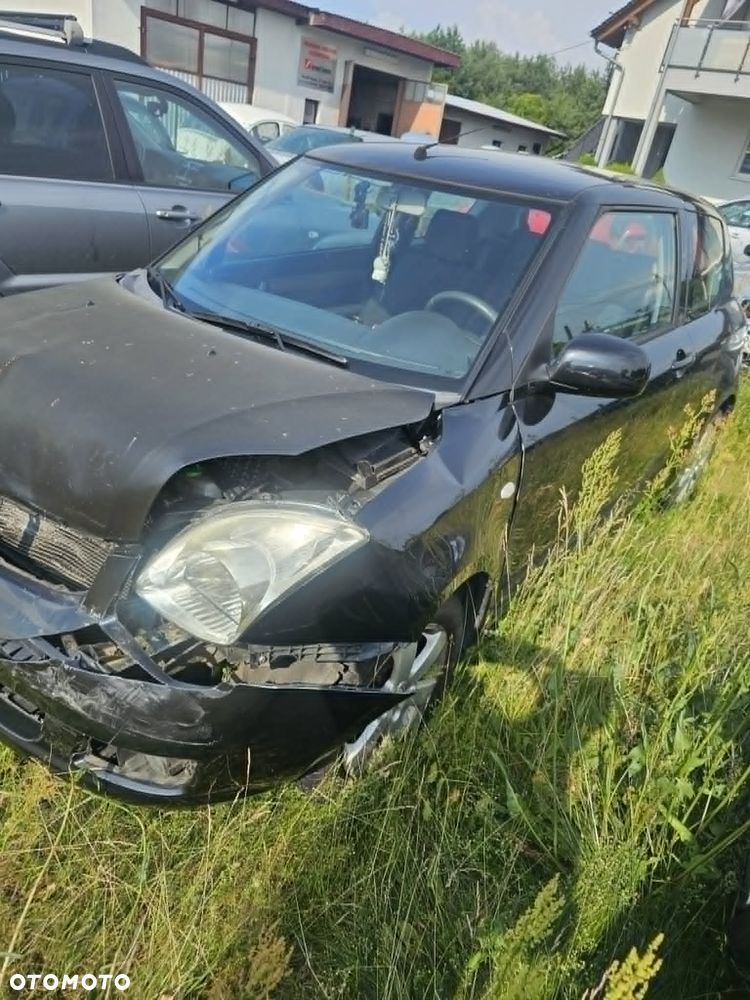 Suzuki Swift 1.3 Club - 3