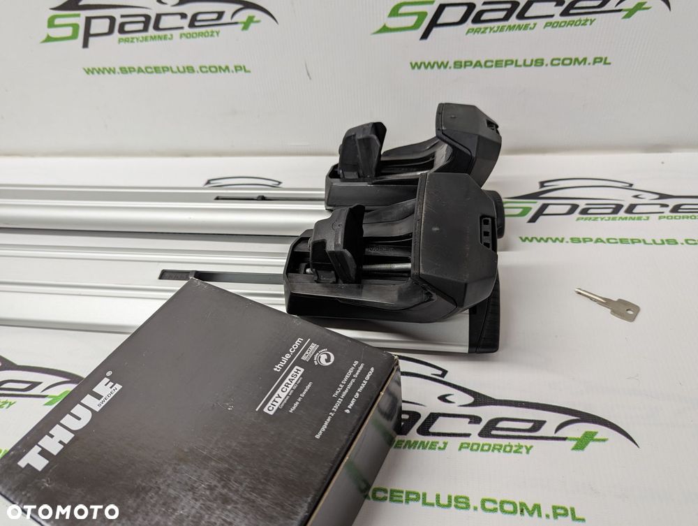 Bagażnik dachowy Thule: belki 961 + Stopy 7104 Na otwarte relingi - 7