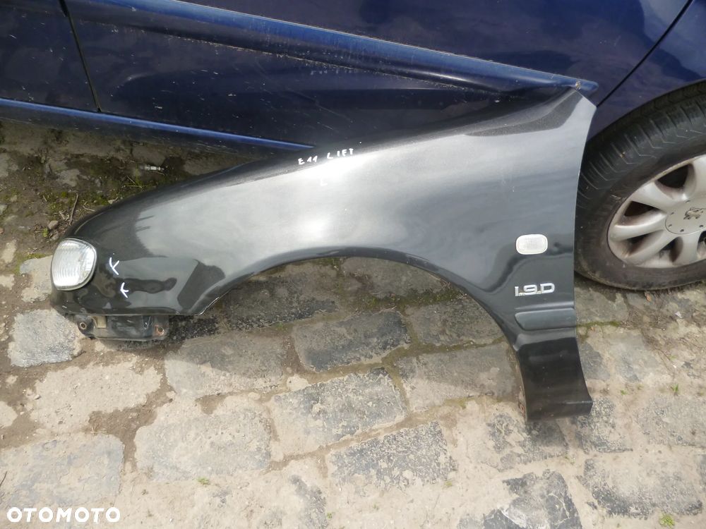 toyota corolla e11 lift błotnik lewy