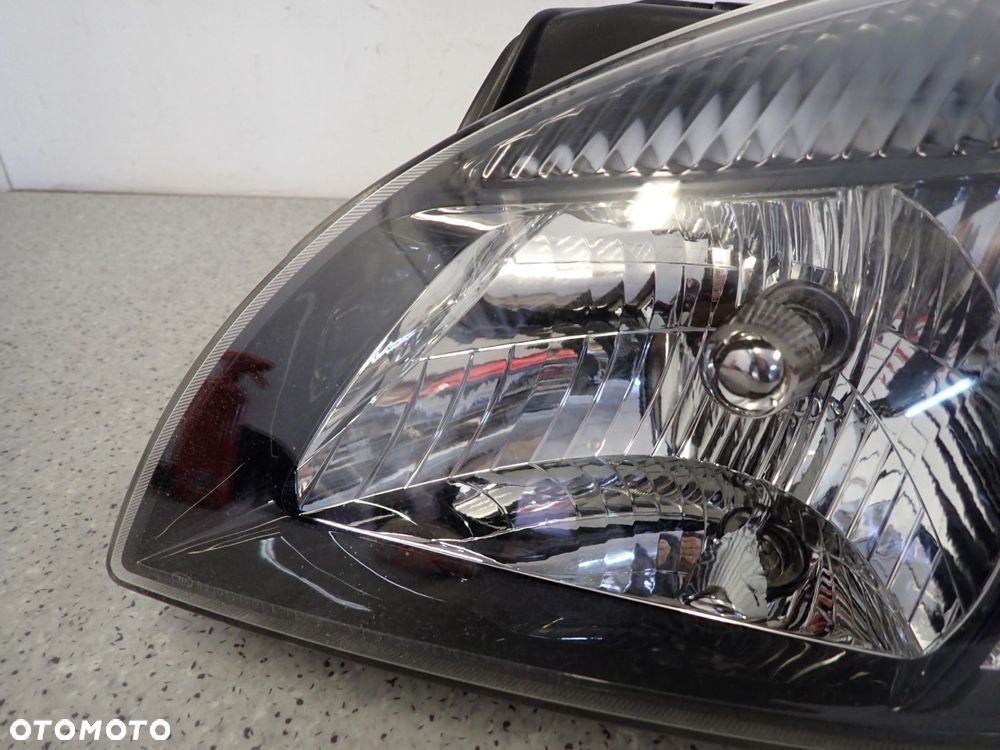 KIA RIO II 10-12 REFLEKTOR LEWY LAMPA PRZEDNIA LEWA - 10