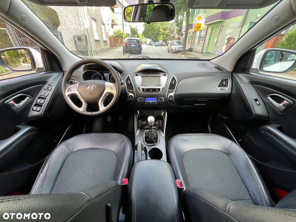 Hyundai ix35 blue 1.6 2WD Finale Gold - 14