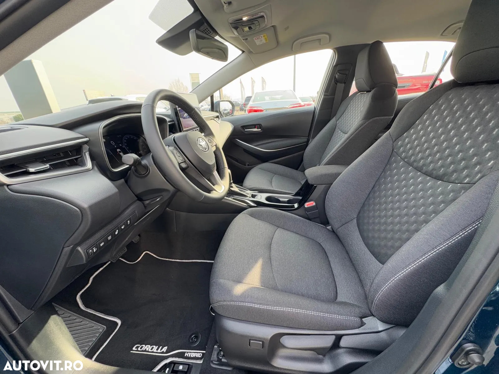 Toyota Corolla 1.8 HSD Business - 32