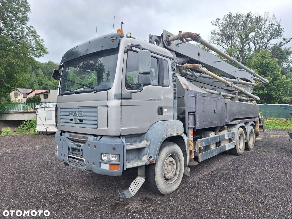 MAN Tga 33.400 6X4 + Kcp 38 Zx170 - 1