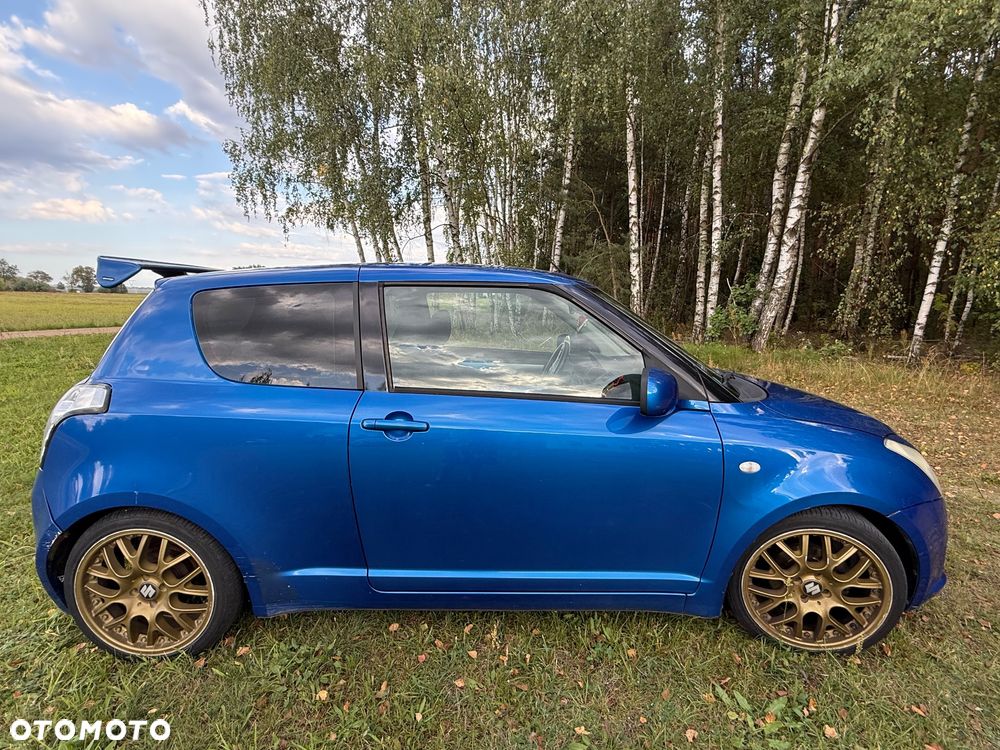 Suzuki Swift 1.3 Club - 4