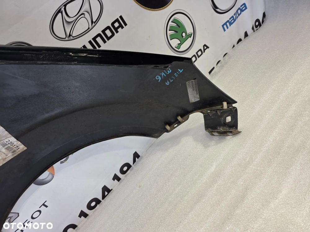 FORD FIESTA MK6 , LIFT 02-08 LEWY BŁOTNIK PRZEDNI PRZÓD NR AUKCJI BŁ250 - 19