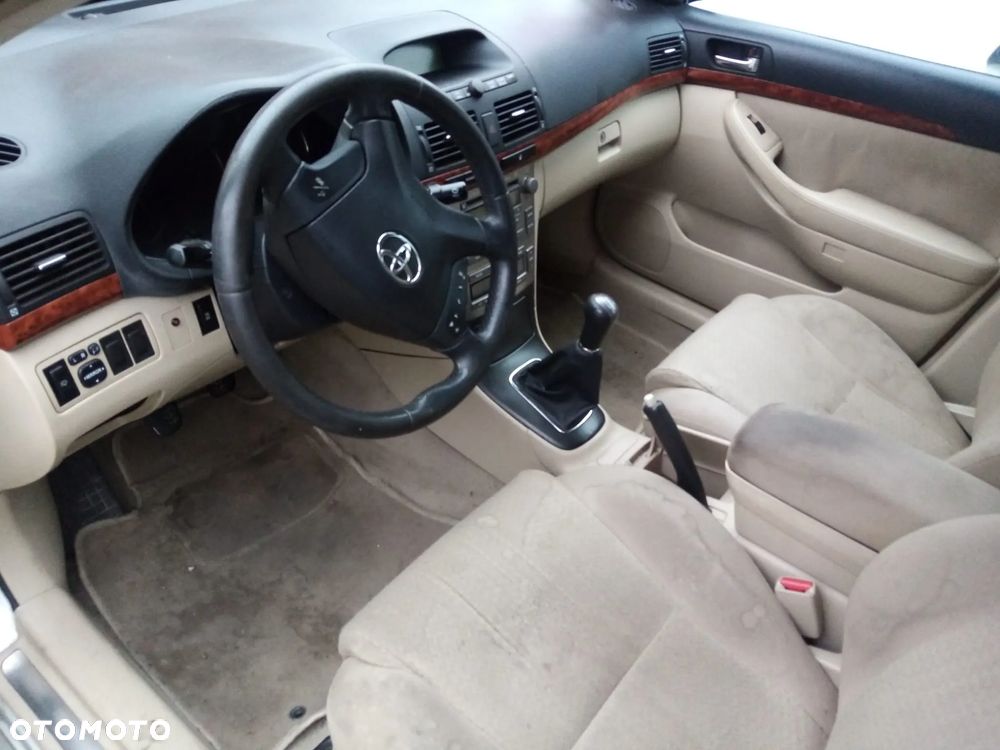 TOYOTA AVENSIS T25 2.0 VVT-i  03-06   OSŁONA PRZECIWSŁONECZNA PRAWA LEWA - 25