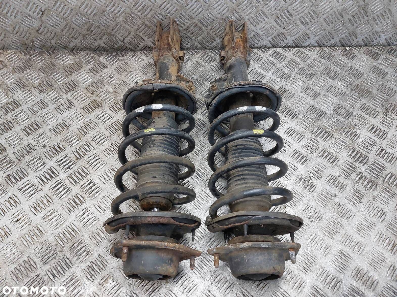 AMORTYZATOR + SPRĘŻYNA LEWY PRZÓD + PRAWY PRZÓD GETZ I 1.1 12V - 1