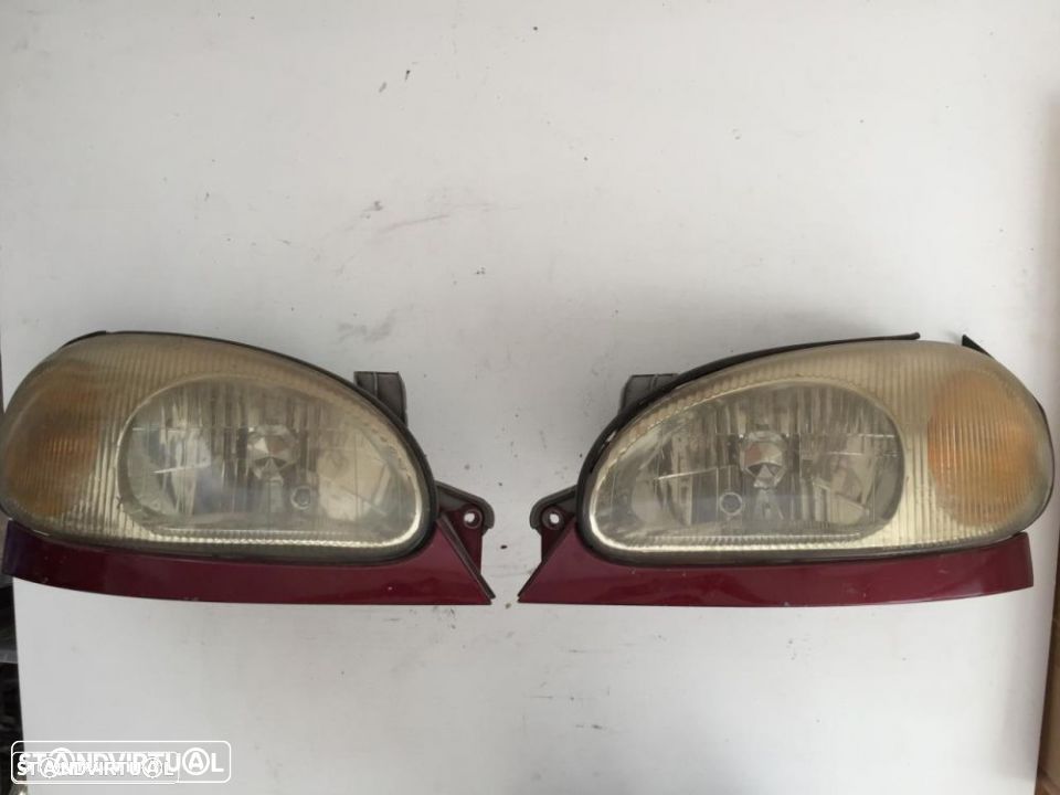 farol optica esquerdo / direito daweoo lanos - 1