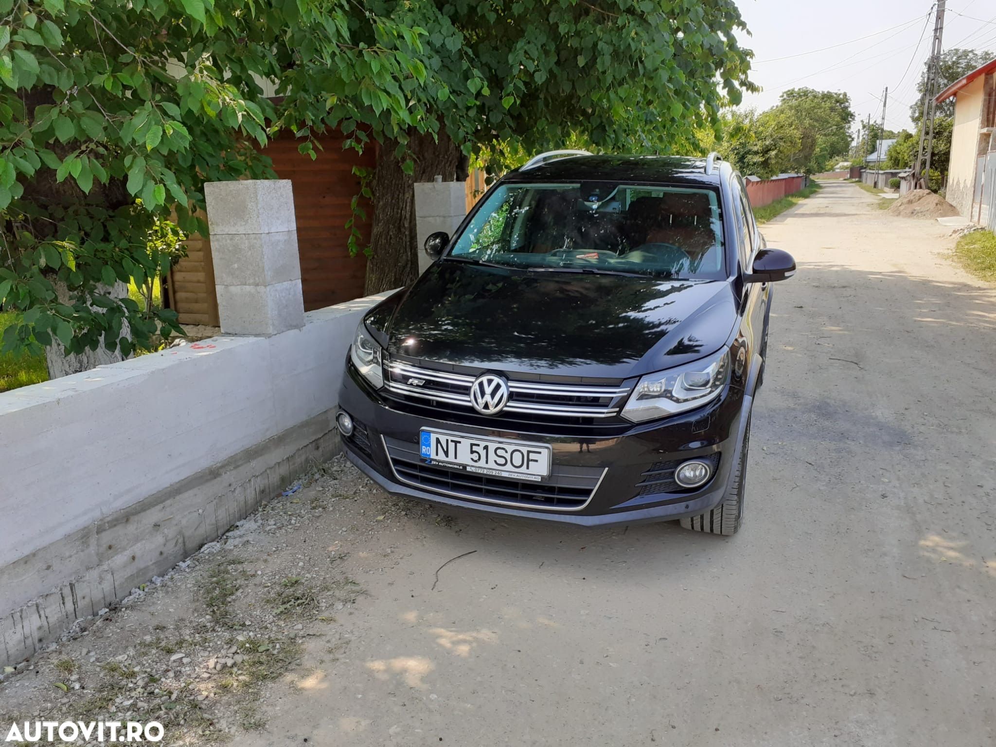 Volkswagen Tiguan 2.0 TDI DPF 4Motion Sport & Style - 1