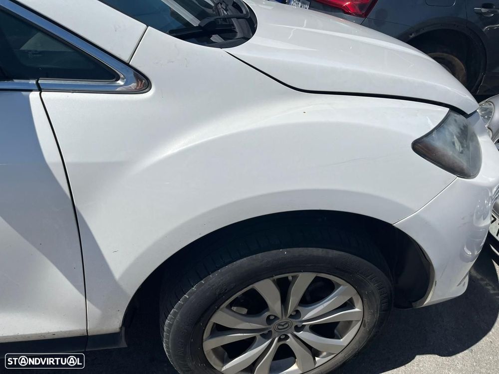 GUARDA-LAMAS FRENTE DIREITO MAZDA CX-7 ER - 1